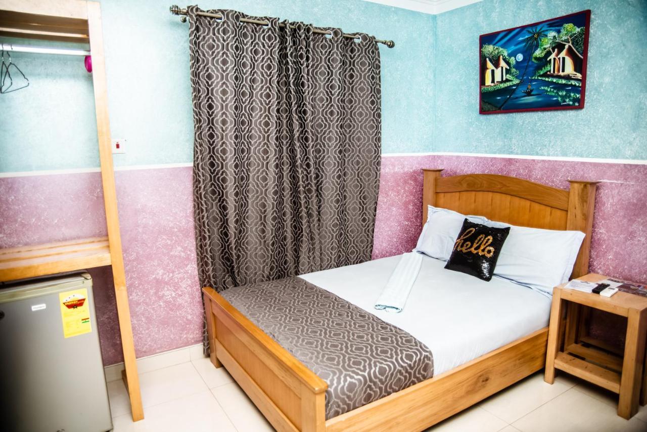 Homey Lodge Кумасі Екстер'єр фото