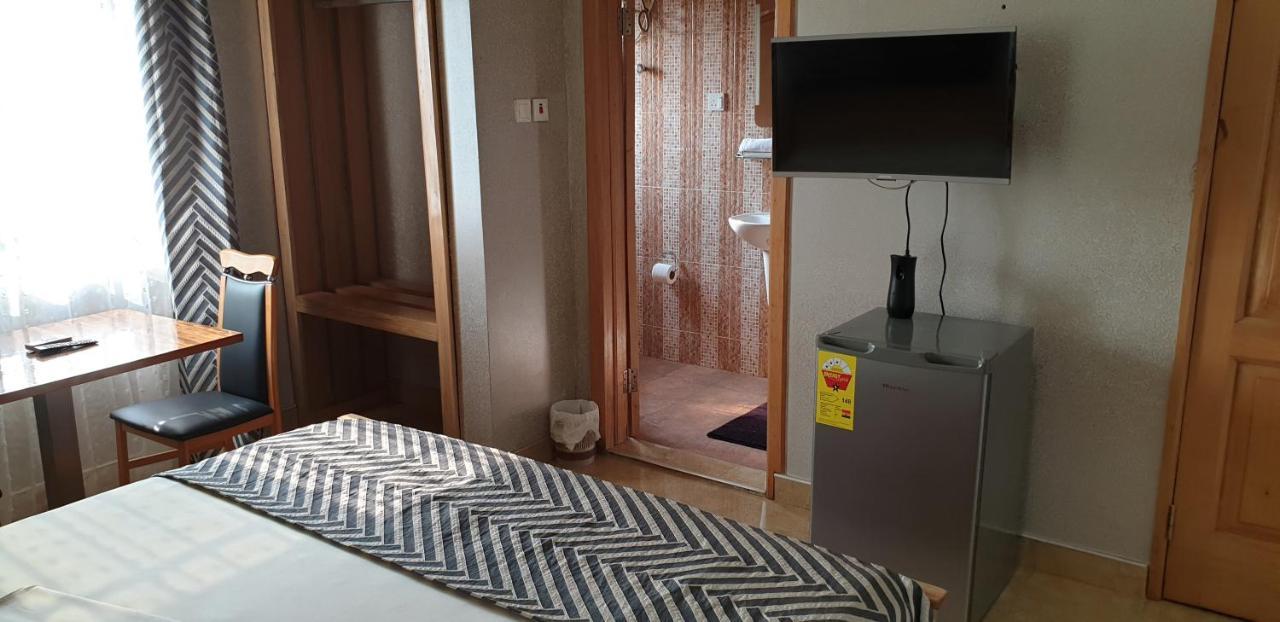 Homey Lodge Кумасі Екстер'єр фото